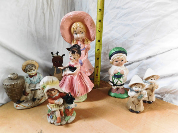 Vintage ceramic figurine lot featuring porcelain children, angels, and a baby for nursery or cottagecore home decor.
